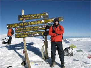 Rob Balls on top of Kilimanjaro.jpg
